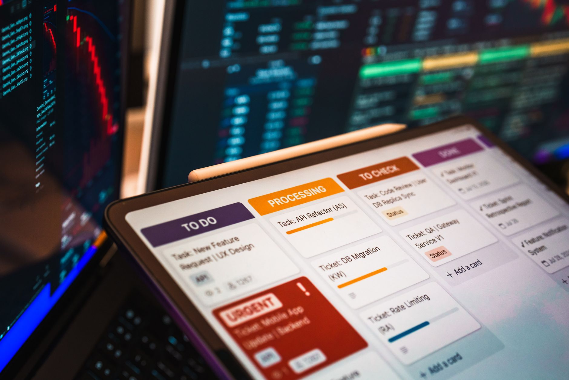 Kanban-style pipeline board on a laptop screen used to track staged lead follow-up