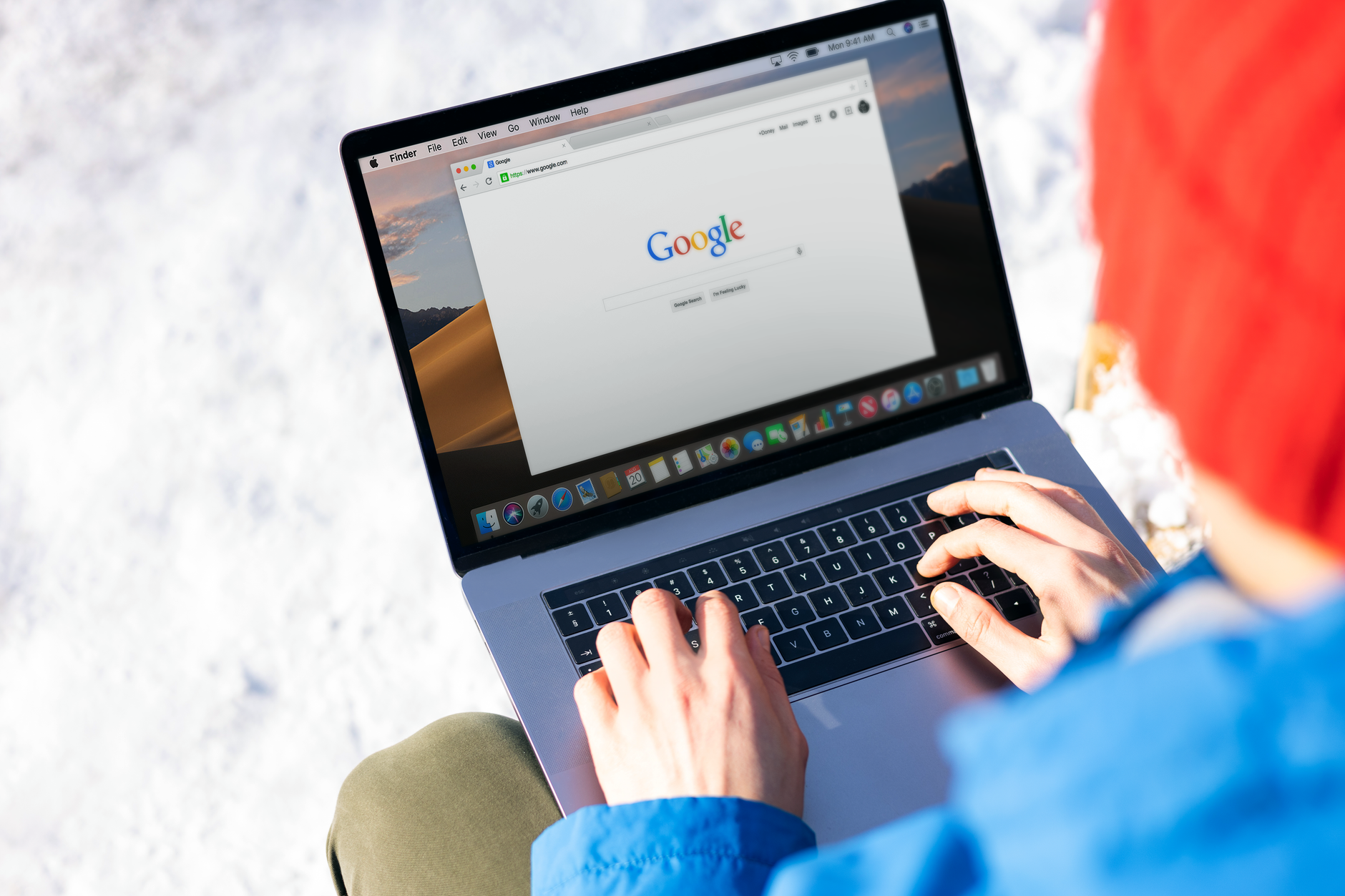 A person checking Google search results on a laptop, the kind of screen where a well-optimized Google Business Profile shows up for local search
