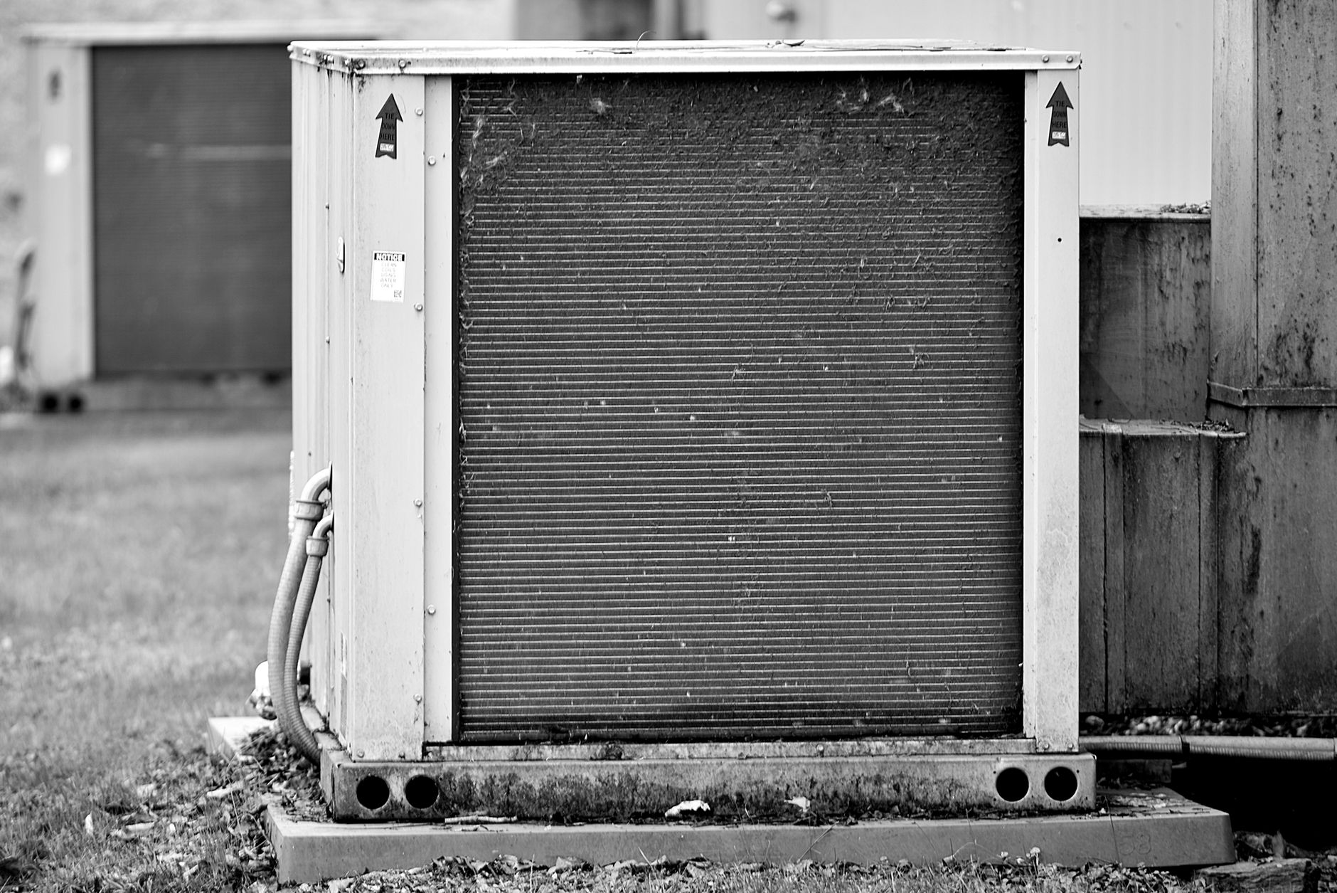 A close-up of an outdoor HVAC condenser unit's fan housing, the kind of equipment a Barrie HVAC company's Google Business Profile photos should feature