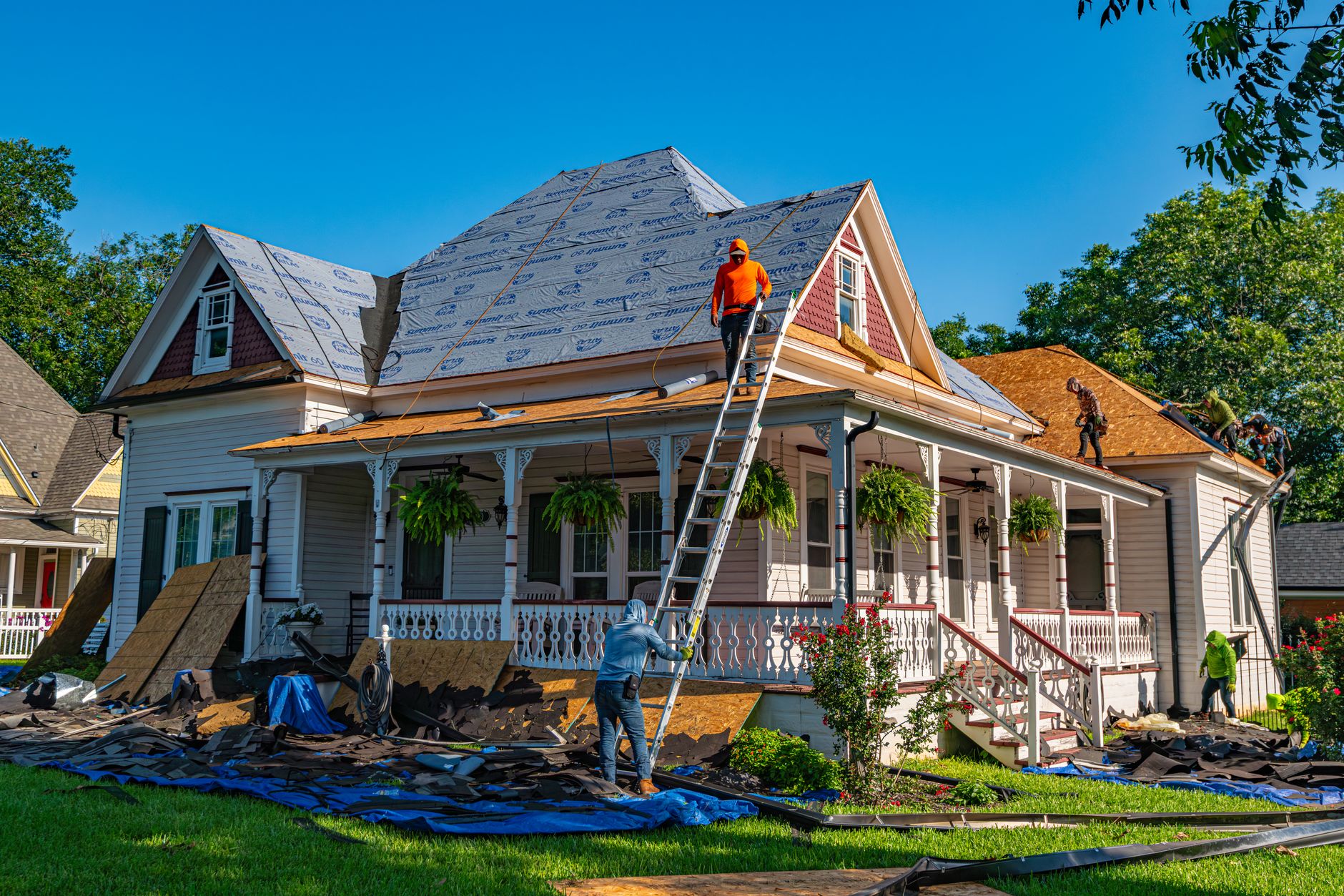 A historic home mid roof replacement, old shingles stripped back to the deck